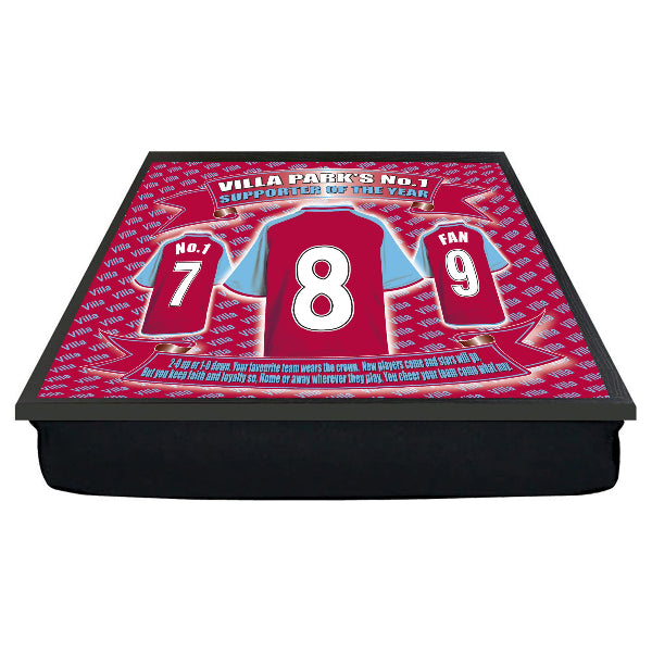 Tabletop display with red sports jerseys and text on a white background