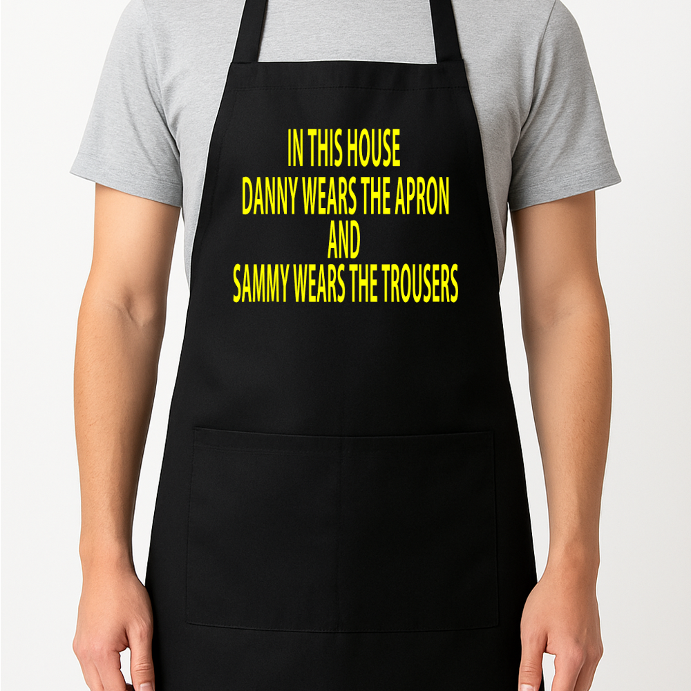 In This House (Name) Wears the Apron And (Name) Wears the Trousers Personalised Apron Gift Present Barbeque