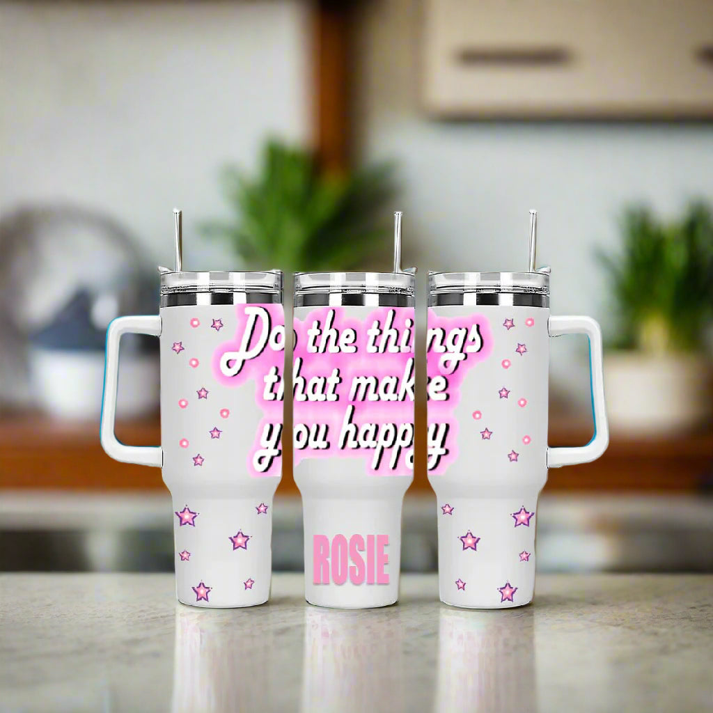 Three white tumblers with pink text and star designs on a white background