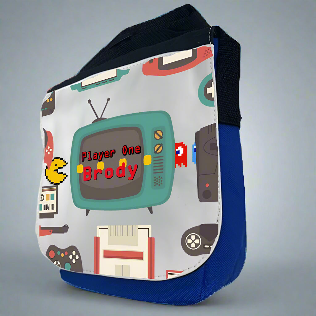 Sling bag with retro gaming design featuring a television and text on a white background