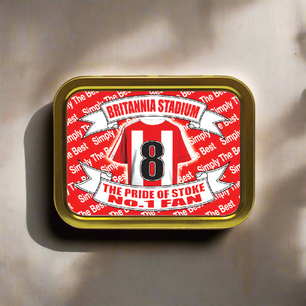 Metallic tin with Britannia Stadium branding and number 8 design on a red background