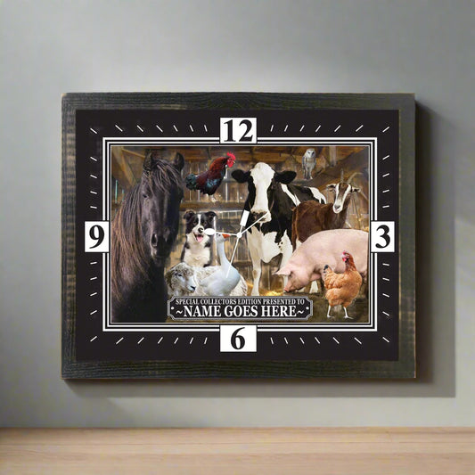 Framed clock with images of farm animals on a white background