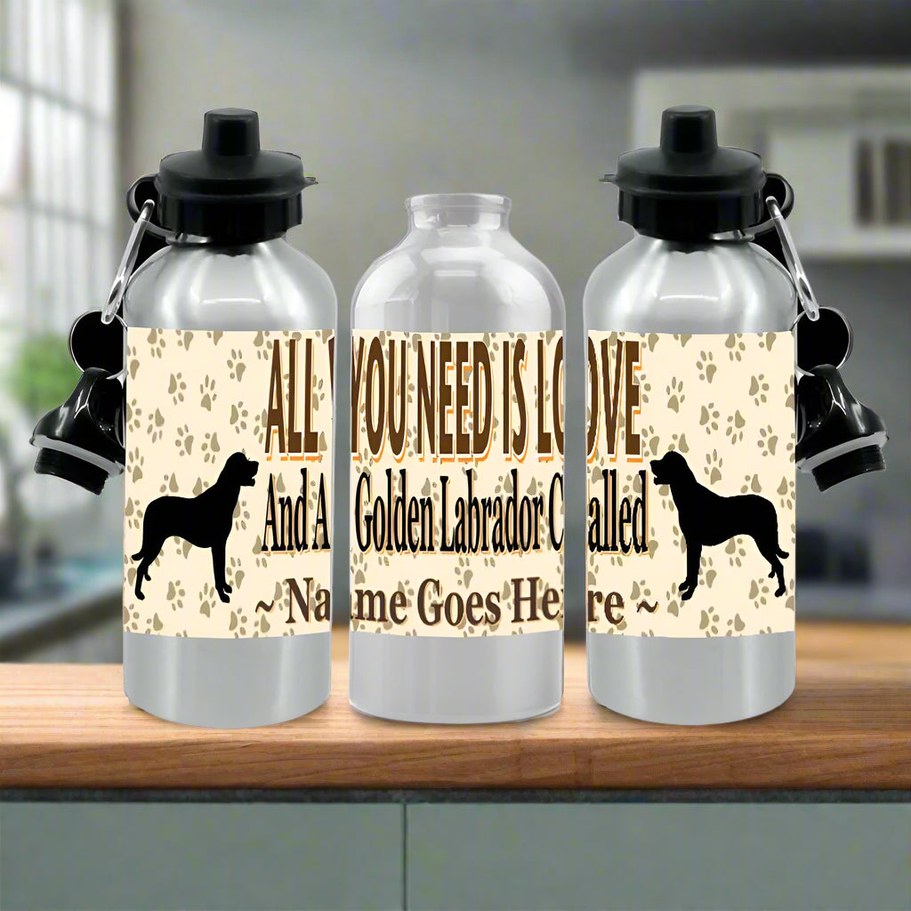 Three silver water bottles with dog-themed labels on a white background