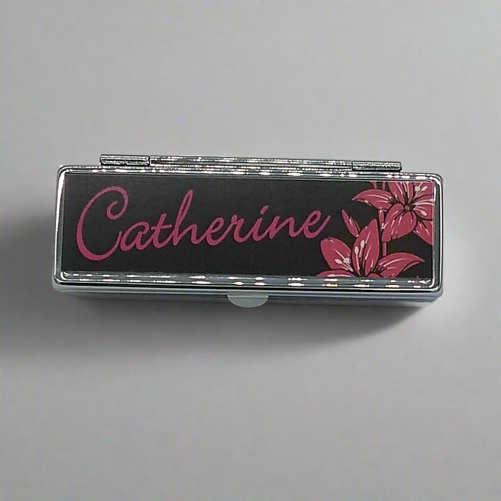 Lipstick Holder with 'Catherine' and floral design on a black background