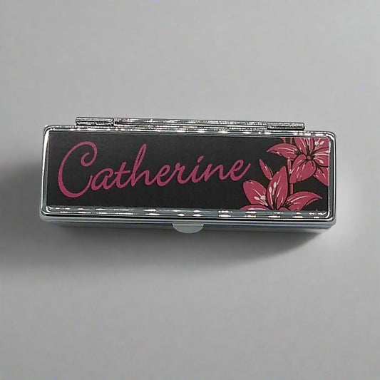 Lipstick Holder with 'Catherine' and floral design on a black background