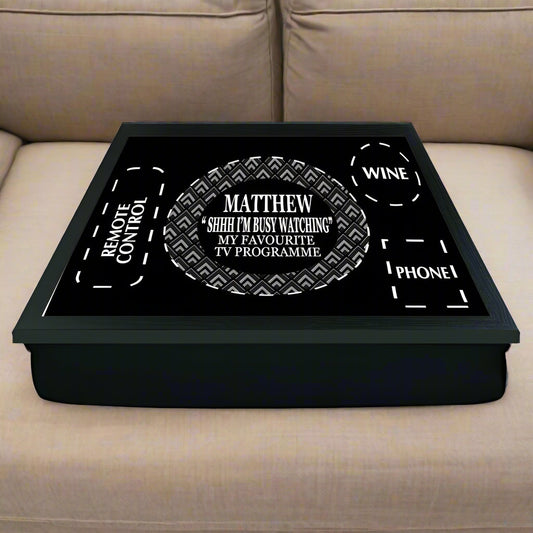 Black tray with white text and design elements on a white background