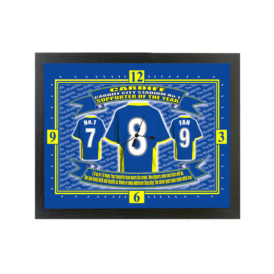 Framed artwork with Cardiff City football club jerseys and text on a blue background