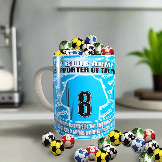 Toy soccer balls in a container labeled 'Blue Army Supporter of the Year' with number 8 on a white background.